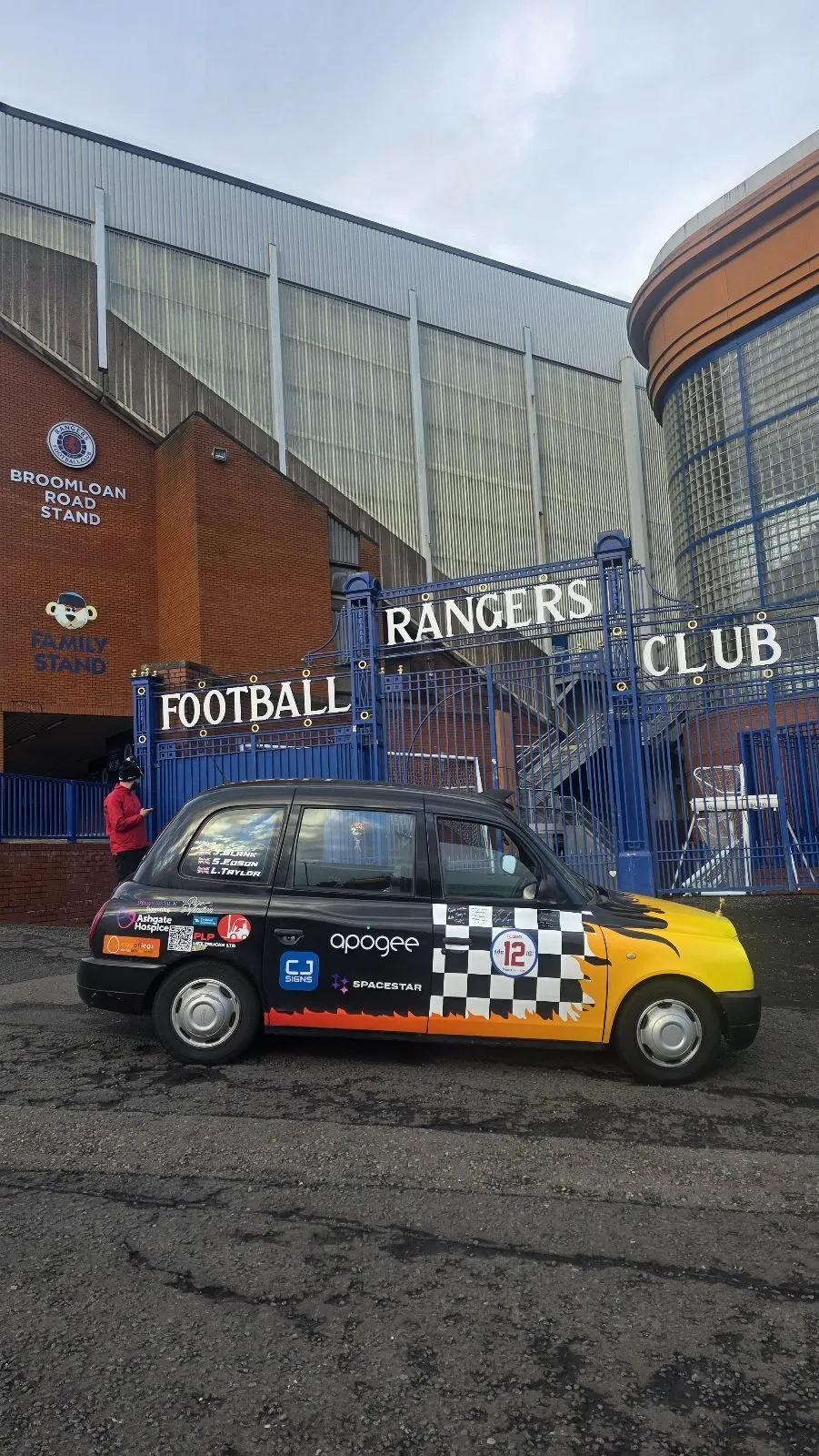 The taxi parked outside Ibrox Stadium in Glasgow