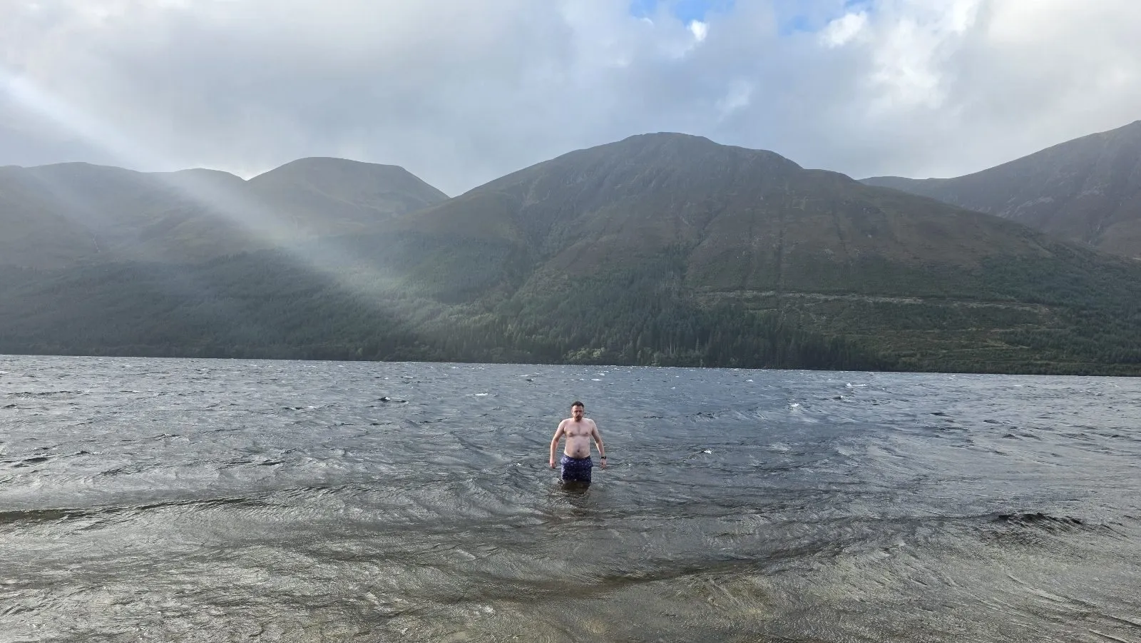 One of the team wading into Loch Lochy for the cold water swim