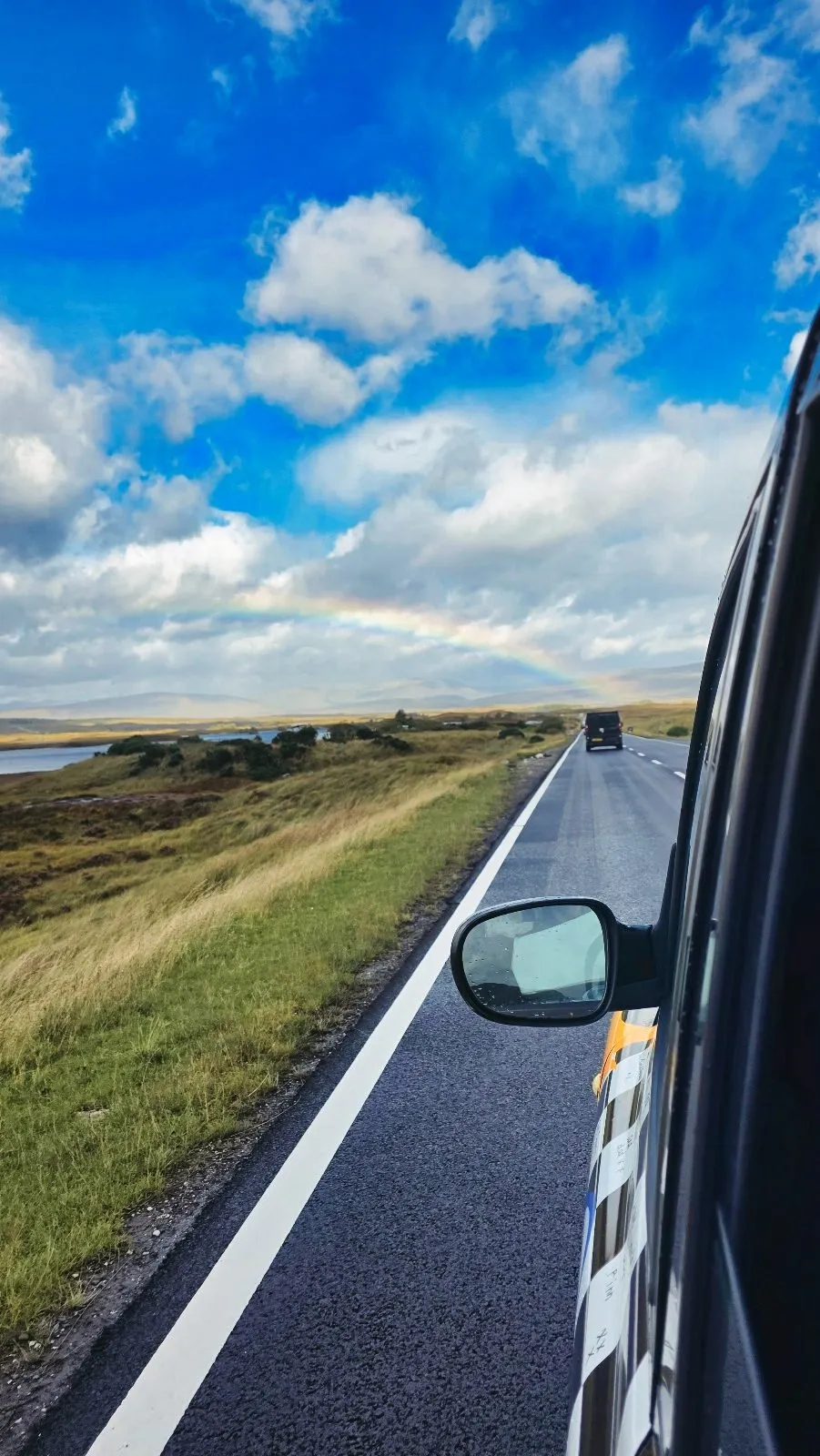 A rainbow over Rannoch Moor, seen from the taxi window